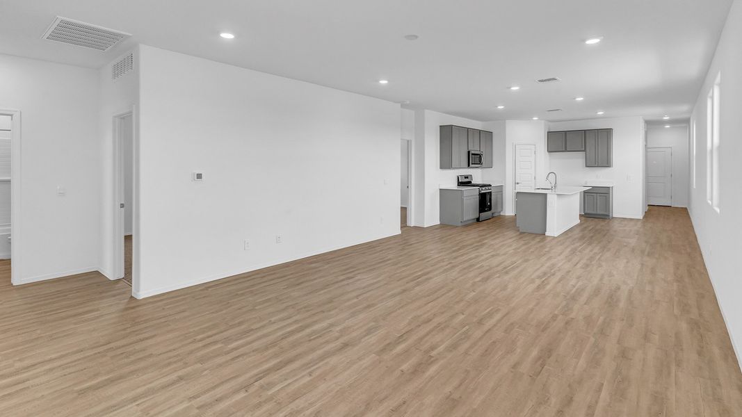 Spacious, unfurnished interior of a new home in Coronet at Gladden Farms, Marana (Image 29). Spacious, unfurnished interior of a new home in Coronet at Gladden Farms, Marana (Image 29).