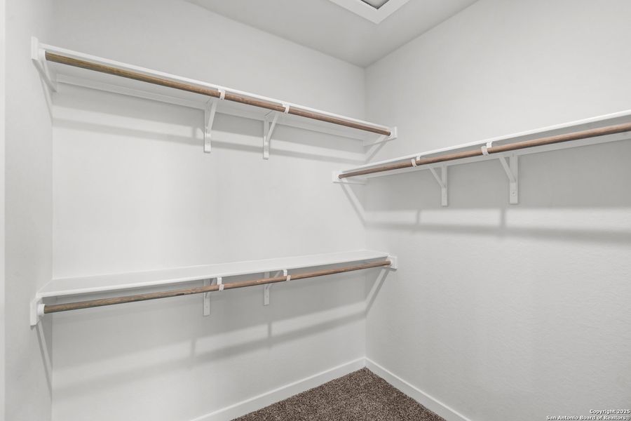 Spacious, unfurnished interior of a new home in The Meadows at Hunters Ranch, San Antonio (Image 27).