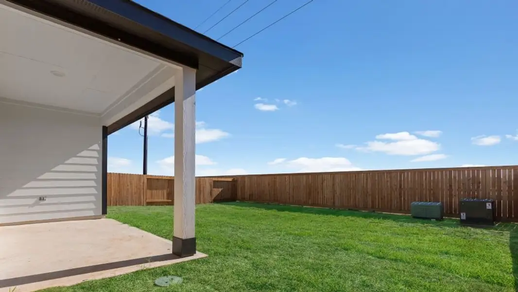 Exterior details and patio area of a home in Tamarron, Fulshear (Image 3). Exterior details and patio area of a home in Tamarron, Fulshear (Image 3).
