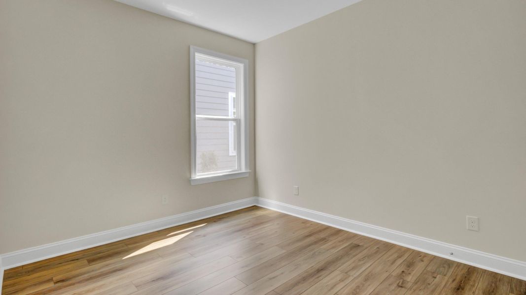 Spacious, unfurnished interior of a new home in Cresswind Charleston, Summerville (Image 22).