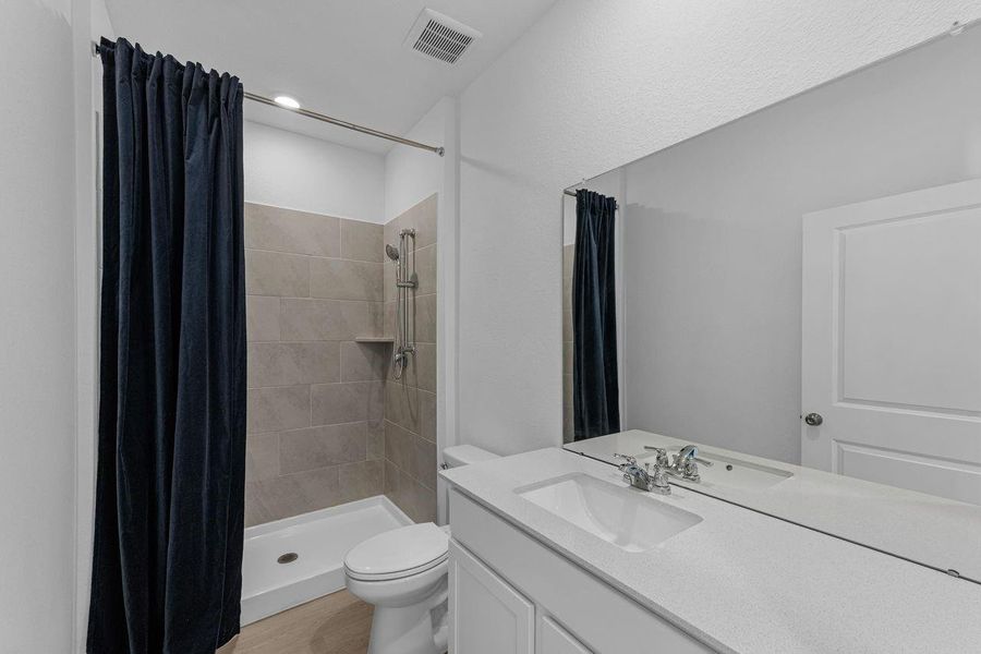 Furnished interior view inside a new home in Riverwood Ranch, Angleton (Image 12).