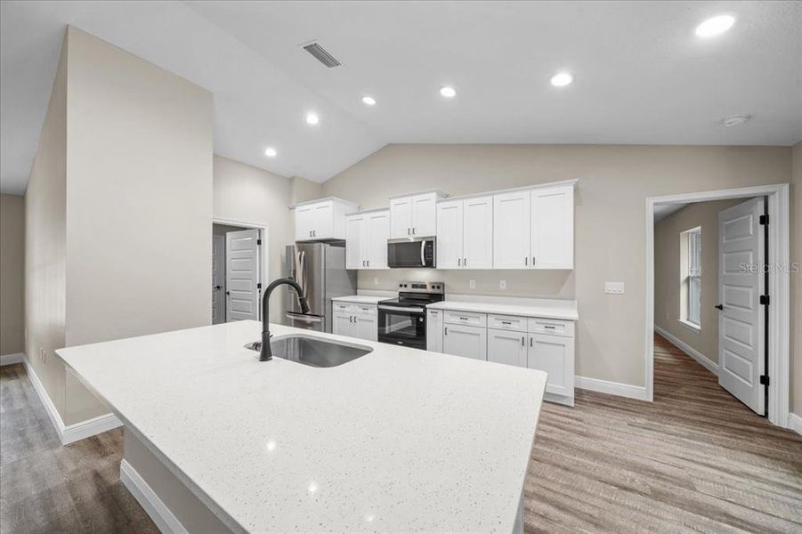 Furnished interior view inside a new home in , Dunnellon (Image 7).