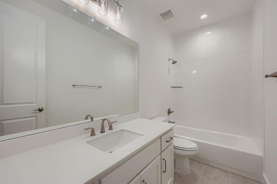 Furnished interior view inside a new home in M3 Ranch 60s, Mansfield (Image 12).