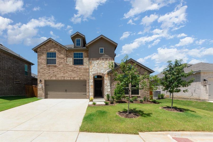 Front exterior of a new home in Courts Of Bonnie Brae, Denton, TX, highlighting curb appeal (Image 2).