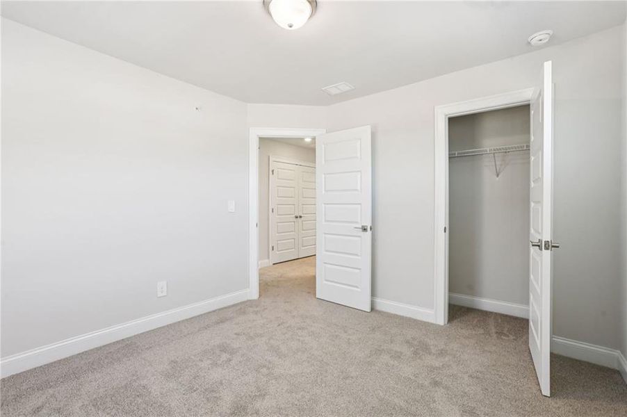 Spacious, unfurnished interior of a new home in Hemingway - Highland Series, Cumming (Image 34).