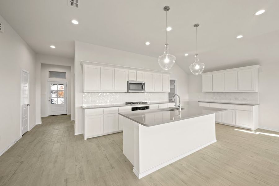 Front exterior of a new home in Myrtle Creek, Waxahachie, TX, highlighting curb appeal (Image 11). Front exterior of a new home in Myrtle Creek, Waxahachie, TX, highlighting curb appeal (Image 11).