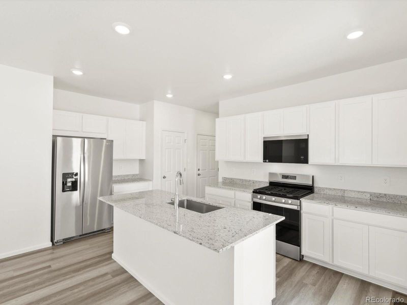Furnished interior view inside a new home in Lake Bluff, Greeley (Image 6). Furnished interior view inside a new home in Lake Bluff, Greeley (Image 6).