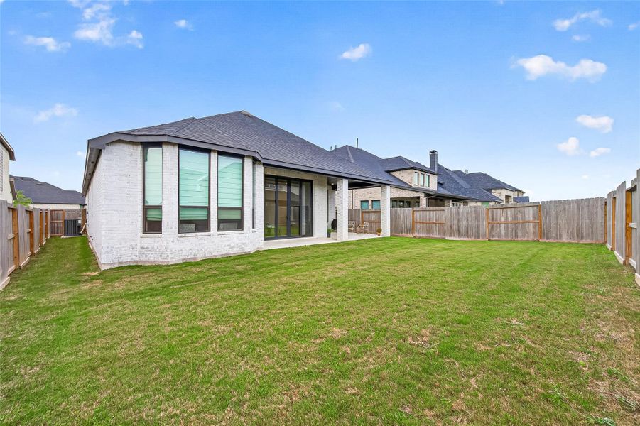 Exterior details and patio area of a home in , Fulshear (Image 29).