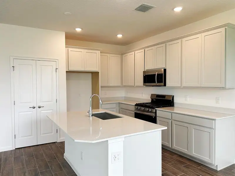 Furnished interior view inside a new home in Summerbrooke, Mount Dora (Image 2). Furnished interior view inside a new home in Summerbrooke, Mount Dora (Image 2).