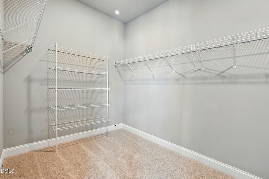 Primary Walk-in-Closet Primary Walk-in-Closet