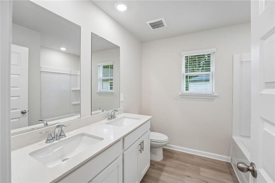 Furnished interior view inside a new home in Hemingway - Reserve Series, Cumming (Image 16). Furnished interior view inside a new home in Hemingway - Reserve Series, Cumming (Image 16).