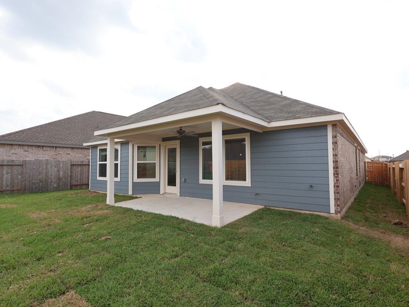 Exterior details and patio area of a home in Magnolia Ridge, Magnolia (Image 3). Exterior details and patio area of a home in Magnolia Ridge, Magnolia (Image 3).