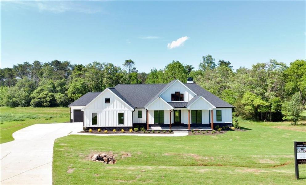 Front exterior of a new home in , Rydal, GA, highlighting curb appeal (Image 24). Front exterior of a new home in , Rydal, GA, highlighting curb appeal (Image 24).