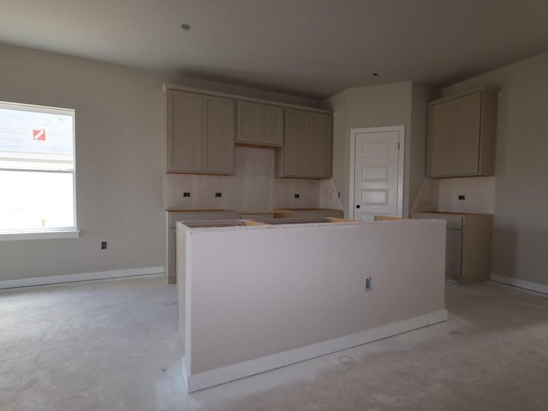 In-progress construction of a new home in Cascades at Onion Creek, Austin, TX (Image 7).