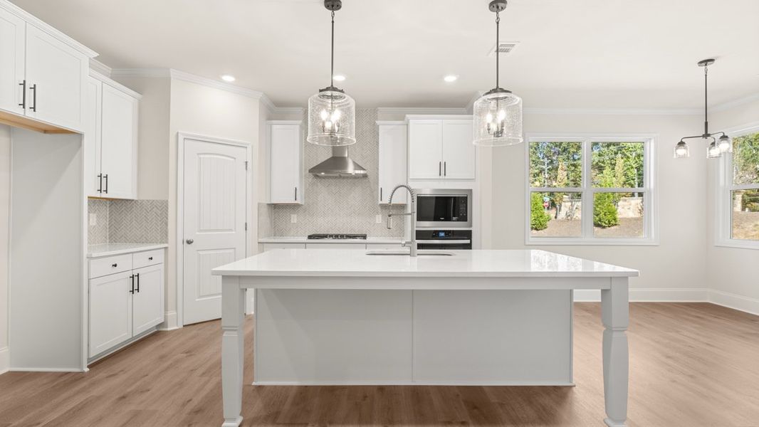 Representative furnished interior of a home built from the WINDSOR by D.R. Horton in Butner Estates, South Fulton (Image 7).