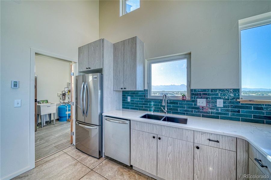 Laundry/Mechanical/Utility Room opens from Kitchen
