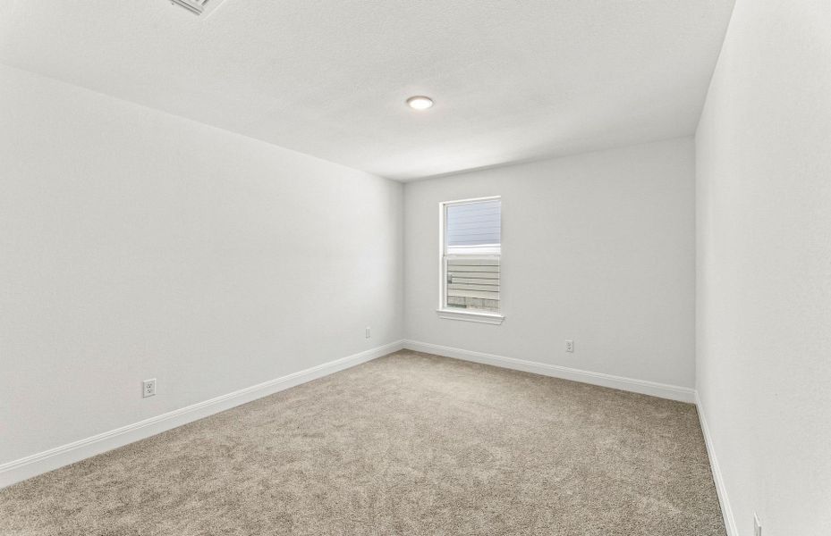 Spacious, unfurnished interior of a new home in Saddleback at Santa Rita Ranch, Liberty Hill (Image 56).