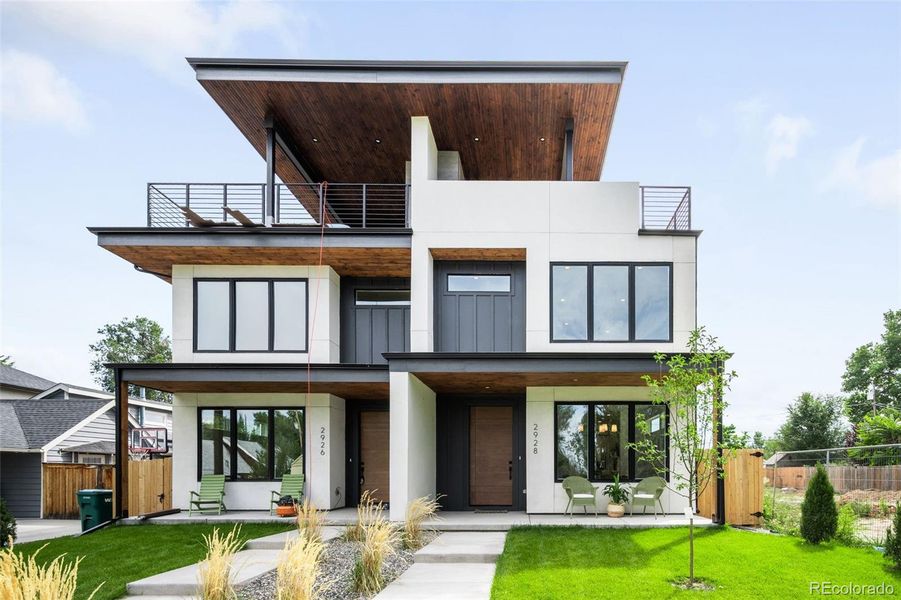 Front exterior of a new home in , Englewood, CO, highlighting curb appeal (Image 24).