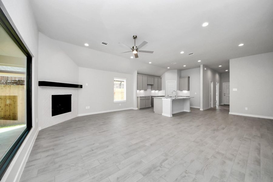 Take another glimpse into the heart of the home with this additional view of the family room—a sprawling space ready to accommodate all your gatherings. Sample photo of completed home with similar floor plan. Actual colors and selections may vary. Take another glimpse into the heart of the home with this additional view of the family room—a sprawling space ready to accommodate all your gatherings. Sample photo of completed home with similar floor plan. Actual colors and selections may vary.