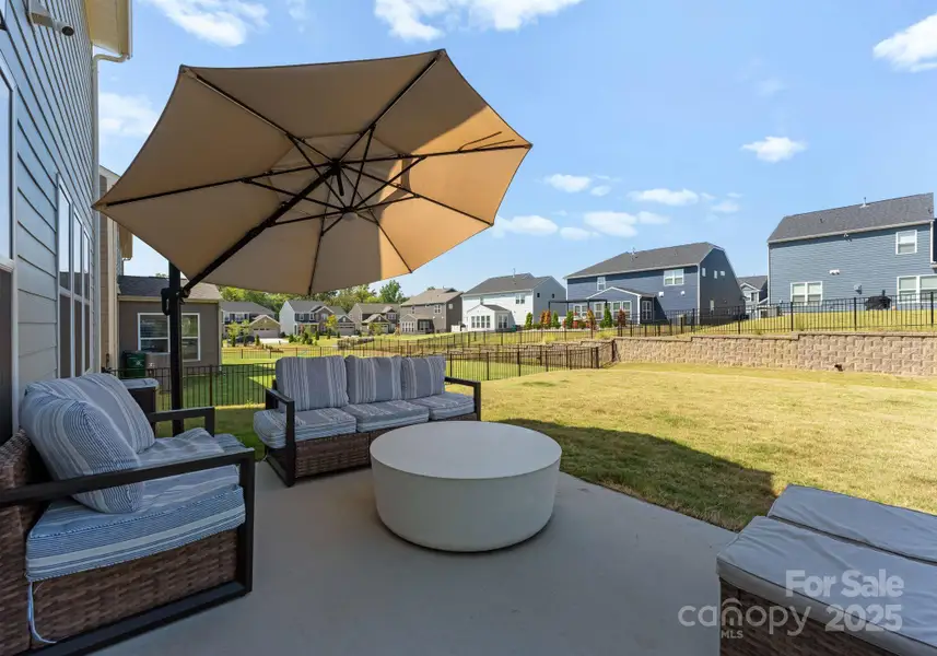 Exterior details and patio area of a home in , Charlotte (Image 4). Exterior details and patio area of a home in , Charlotte (Image 4).