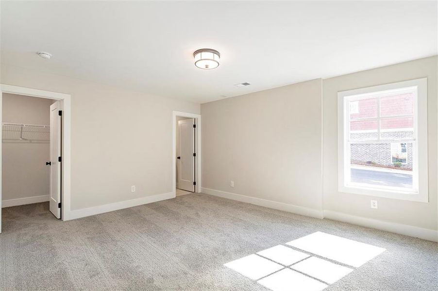 Spacious, unfurnished interior of a new home in Holly Springs Town Center, Holly Springs (Image 24).