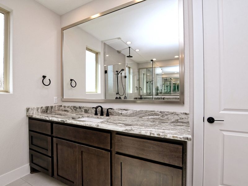 Representative furnished interior of a home built from the Emerald II by Giddens Homes in Riverstone, Georgetown (Image 11).