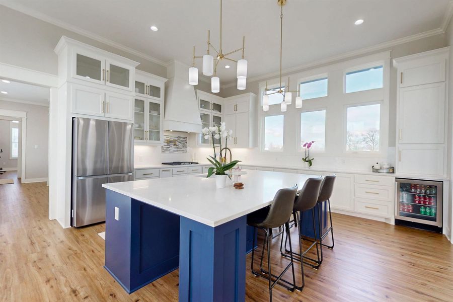 Gorgeous extensive cabinetry. But notice anything different? Wher is the oven and microwave? Those things are in the Butlers Pantry. It is like having 2 kitchens. Entertain, serve and dine in the open kitchen, but keep the mess in the huge pantry. Dreamy!