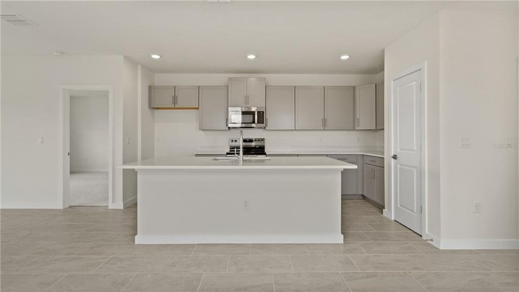Furnished interior view inside a new home in Willowbrook North, Winter Haven (Image 6).