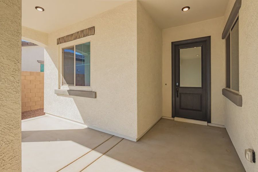 Exterior details and patio area of a home in Valencia at Granite Vista, Waddell (Image 3).