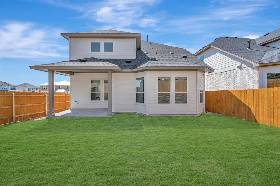 Exterior details and patio area of a home in Heritage, Dripping Springs (Image 4).