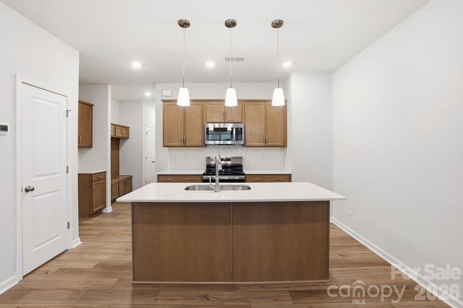 Furnished interior view inside a new home in Sloan Station, Charlotte (Image 6).