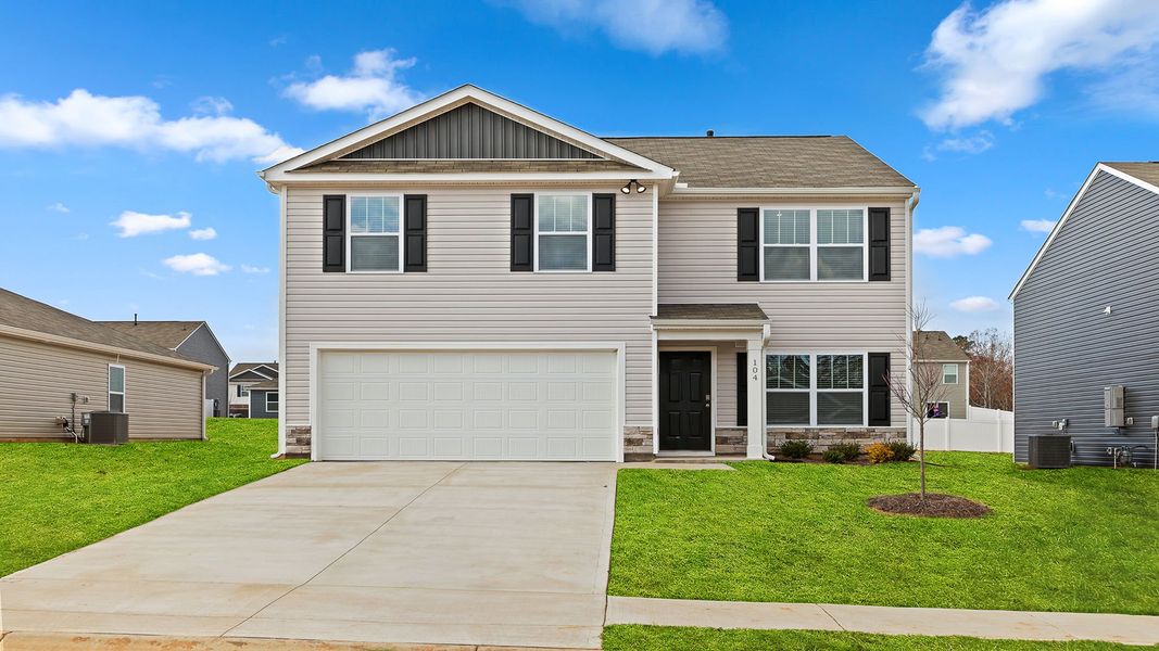 Front exterior of a new home in Bentley Park, Greenwood, SC, highlighting curb appeal (Image 1). Front exterior of a new home in Bentley Park, Greenwood, SC, highlighting curb appeal (Image 1).