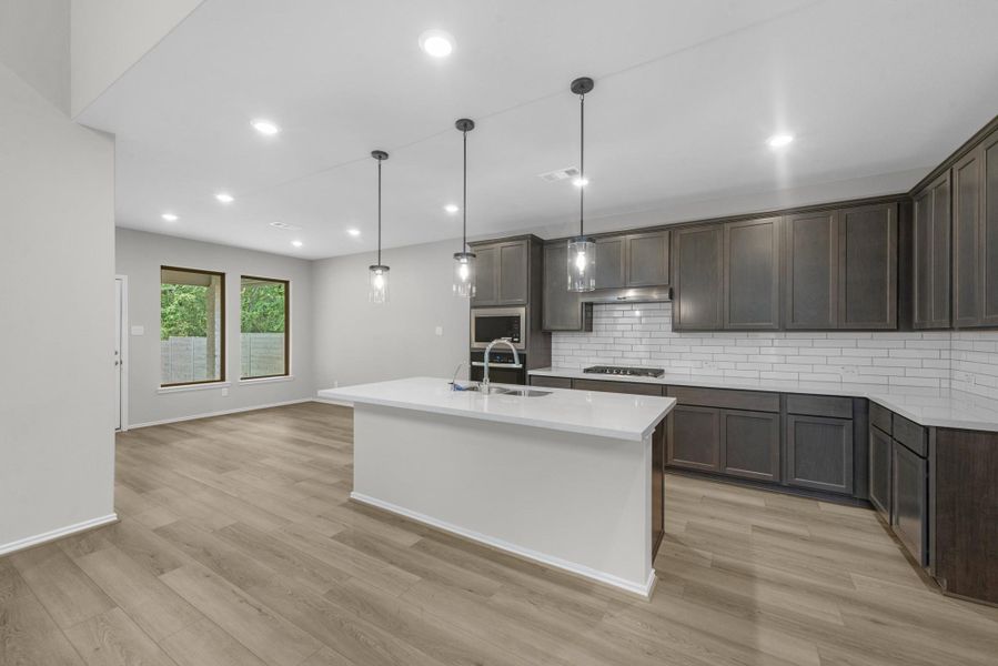 View of the kitchen and breakfast area.