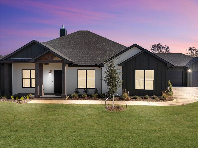 Front exterior of a new home in , Smithville, TX, highlighting curb appeal (Image 24).