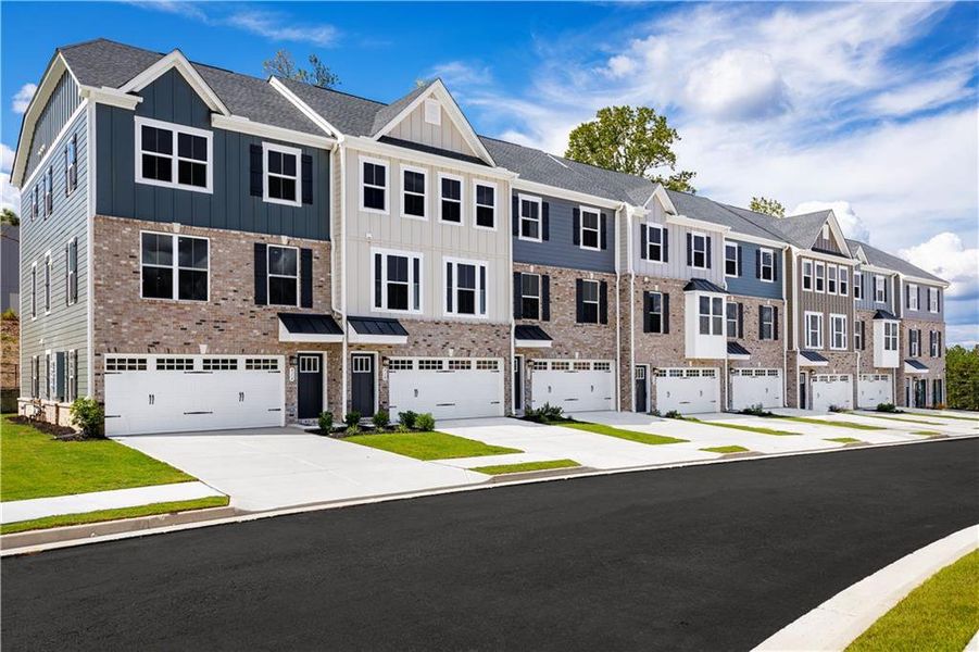 Front exterior of a new home in , Lawrenceville, GA, highlighting curb appeal (Image 1).