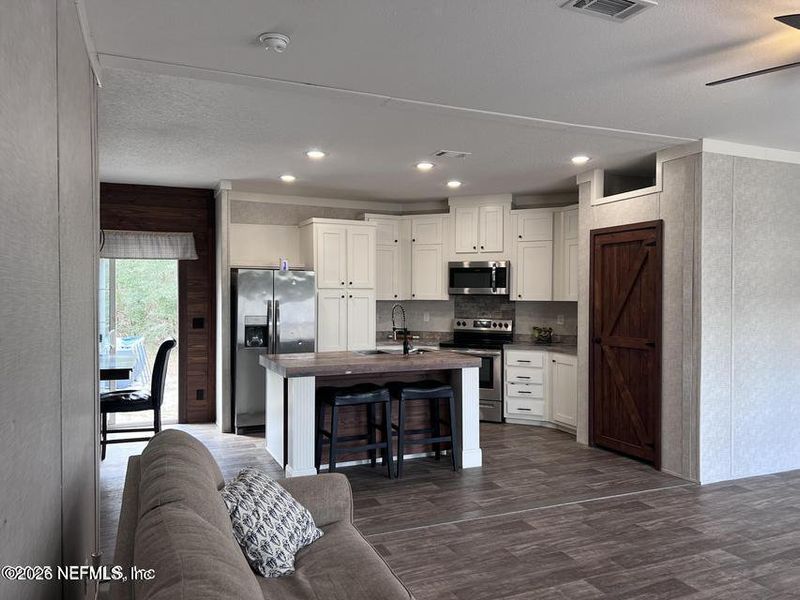 Furnished interior view inside a new home in , Live Oak (Image 5).