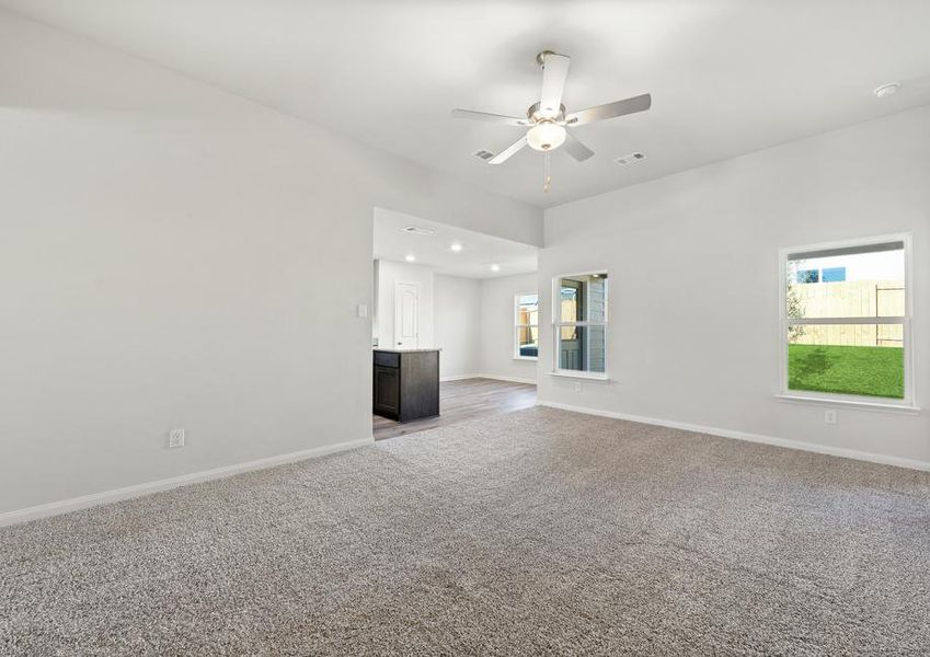 The family room of the Blanco has large windows that let in great, natural light.