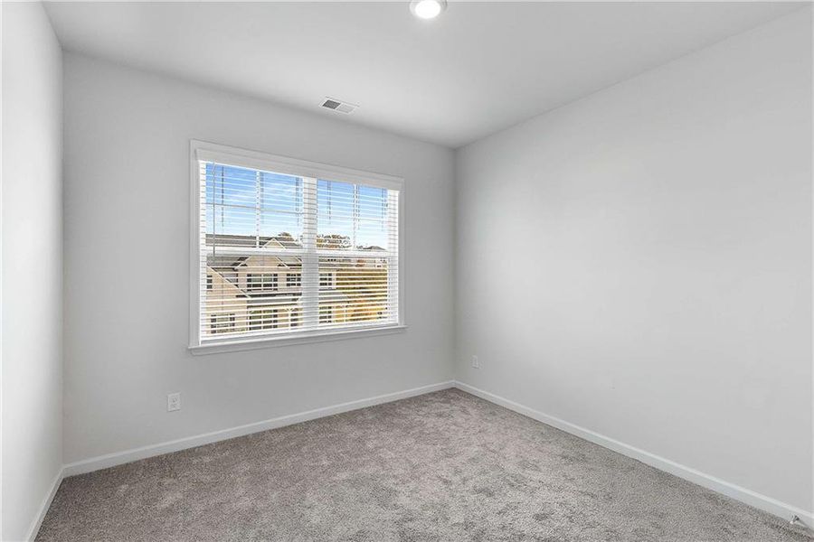 Spacious, unfurnished interior of a new home in Carmichael Farms, Canton (Image 48).