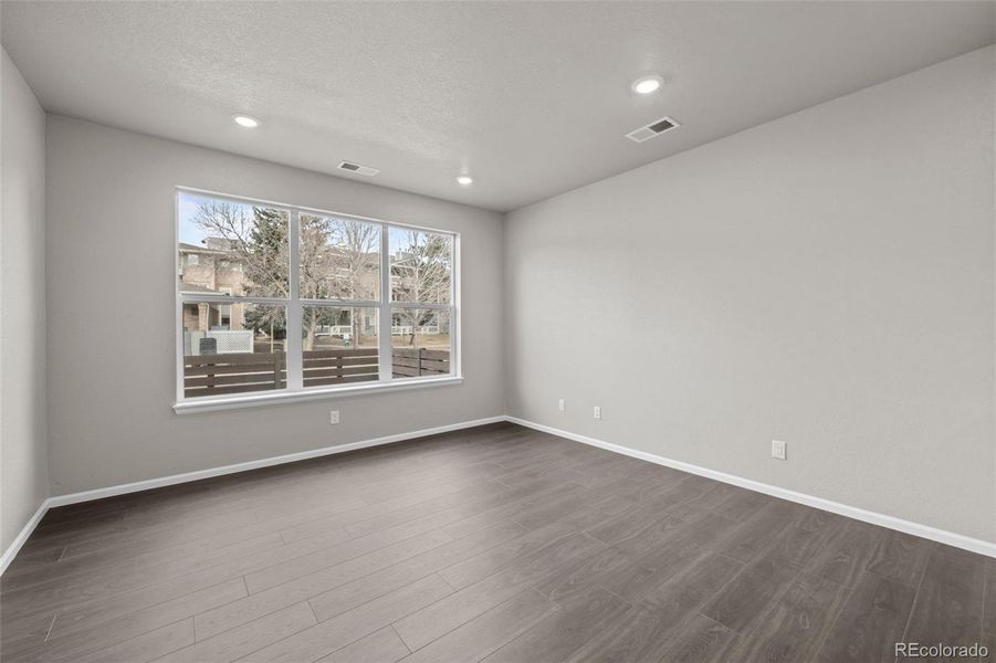 Spacious, unfurnished interior of a new home in Ralston Creek, Arvada (Image 22).