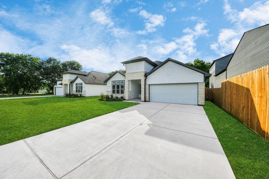 Front exterior of a new home in , Beasley, TX, highlighting curb appeal (Image 1). Front exterior of a new home in , Beasley, TX, highlighting curb appeal (Image 1).