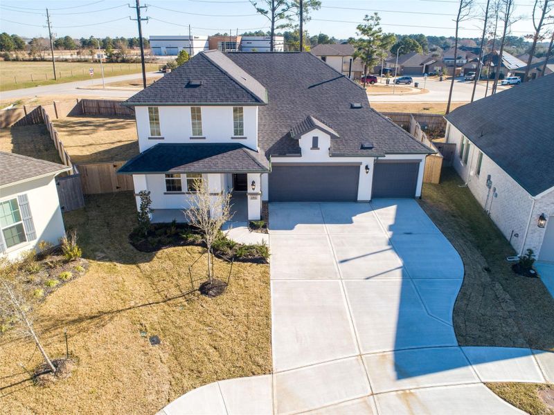 Front exterior of a new home in , Tomball, TX, highlighting curb appeal (Image 1). Front exterior of a new home in , Tomball, TX, highlighting curb appeal (Image 1).