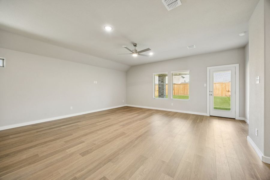 Living Room in the Oscar home plan by Trophy Signature Homes – REPRESENTATIVE PHOTO