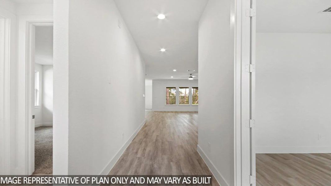 Representative unfurnished interior of a home built from the Luna by D.R. Horton in Riverside Estates, Mont Belvieu (Image 8).