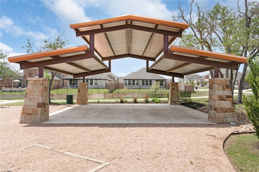 A spacious covered outdoor area awaits, perfect for gatherings with community park access. A spacious covered outdoor area awaits, perfect for gatherings with community park access.