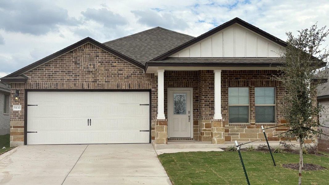 Front exterior of a new home in Three Creeks - Colt Creek, Belton, TX, highlighting curb appeal (Image 20). Front exterior of a new home in Three Creeks - Colt Creek, Belton, TX, highlighting curb appeal (Image 20).