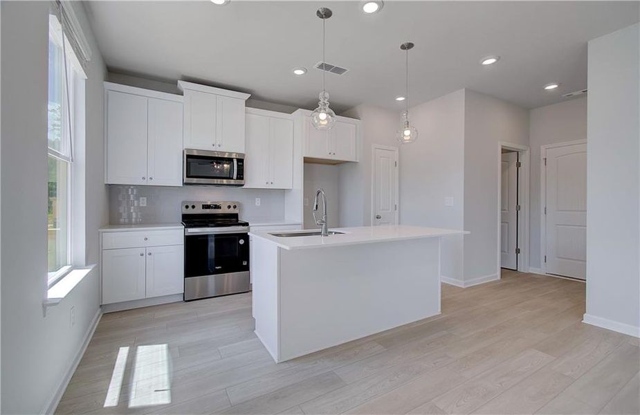 Furnished interior view inside a new home in Enclave at Evergreen, Fairburn (Image 5).
