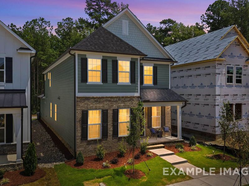 Front exterior of a new home in Forestville Yard, Knightdale, NC, highlighting curb appeal (Image 24). Front exterior of a new home in Forestville Yard, Knightdale, NC, highlighting curb appeal (Image 24).