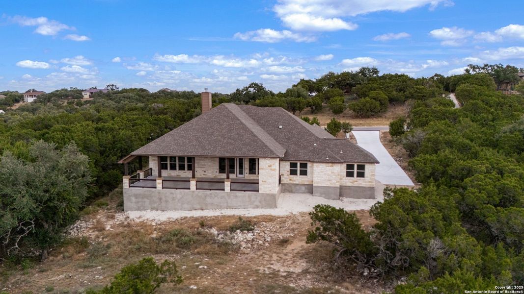 Front exterior of a new home in , New Braunfels, TX, highlighting curb appeal (Image 22). Front exterior of a new home in , New Braunfels, TX, highlighting curb appeal (Image 22).