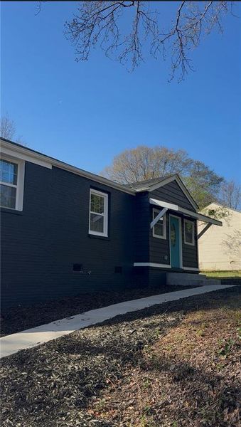 Exterior details and patio area of a home in , West Point (Image 25).