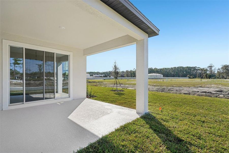 Exterior details and patio area of a home in Legends Preserve - Signature Series, Daytona Beach (Image 21). Exterior details and patio area of a home in Legends Preserve - Signature Series, Daytona Beach (Image 21).